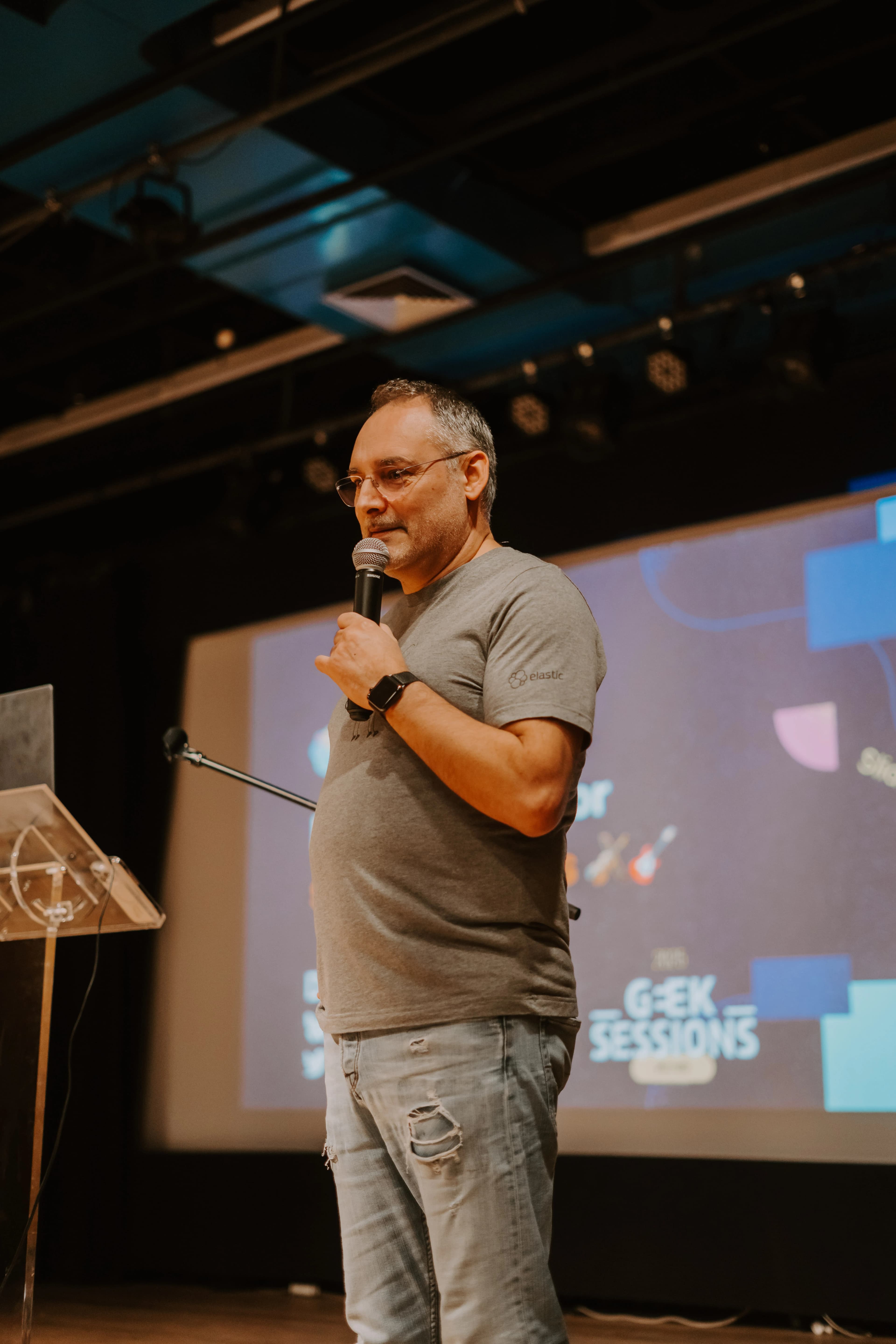 Audience members listening attentively to a tech talk at GeekSessionsConf 2025
